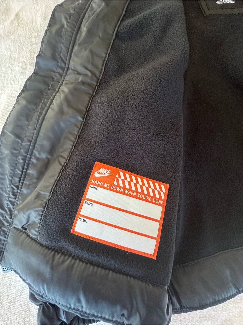 Nike Youth Black Hooded Puffer Jacket with White Swoosh